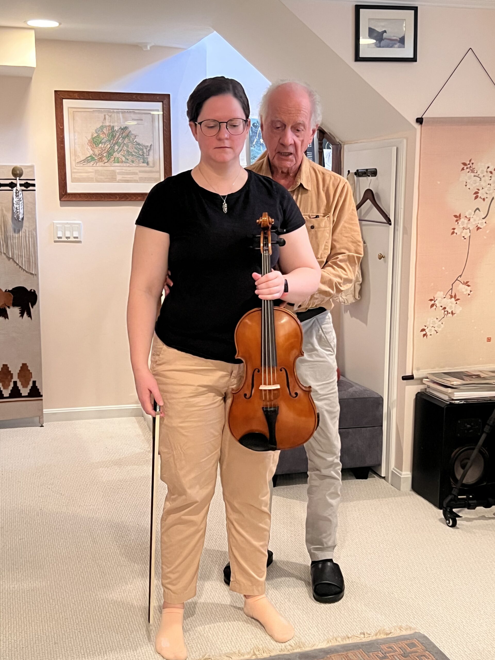 Tommy Thompson guiding a trainee mid-motion in the Alexander Technique, embodying relational use and the principle of Use Is Self.