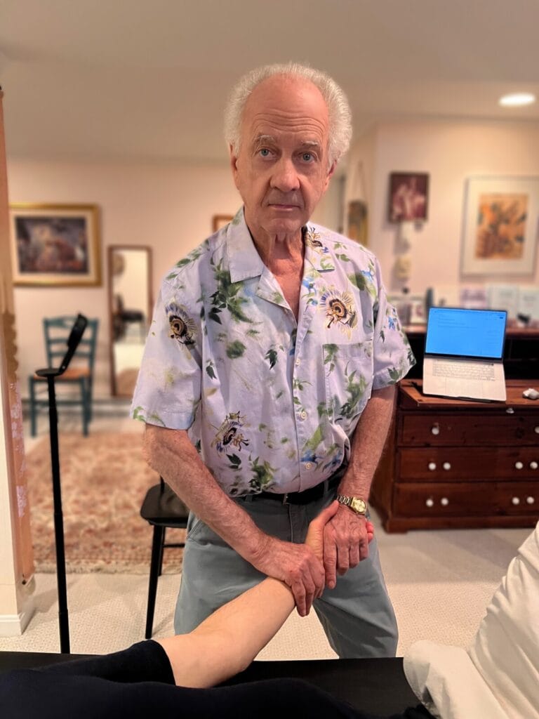 Tommy Thompson guiding a trainee with intention during Alexander Technique Class 024, emphasizing how intention initiates movement and full-body coordination.