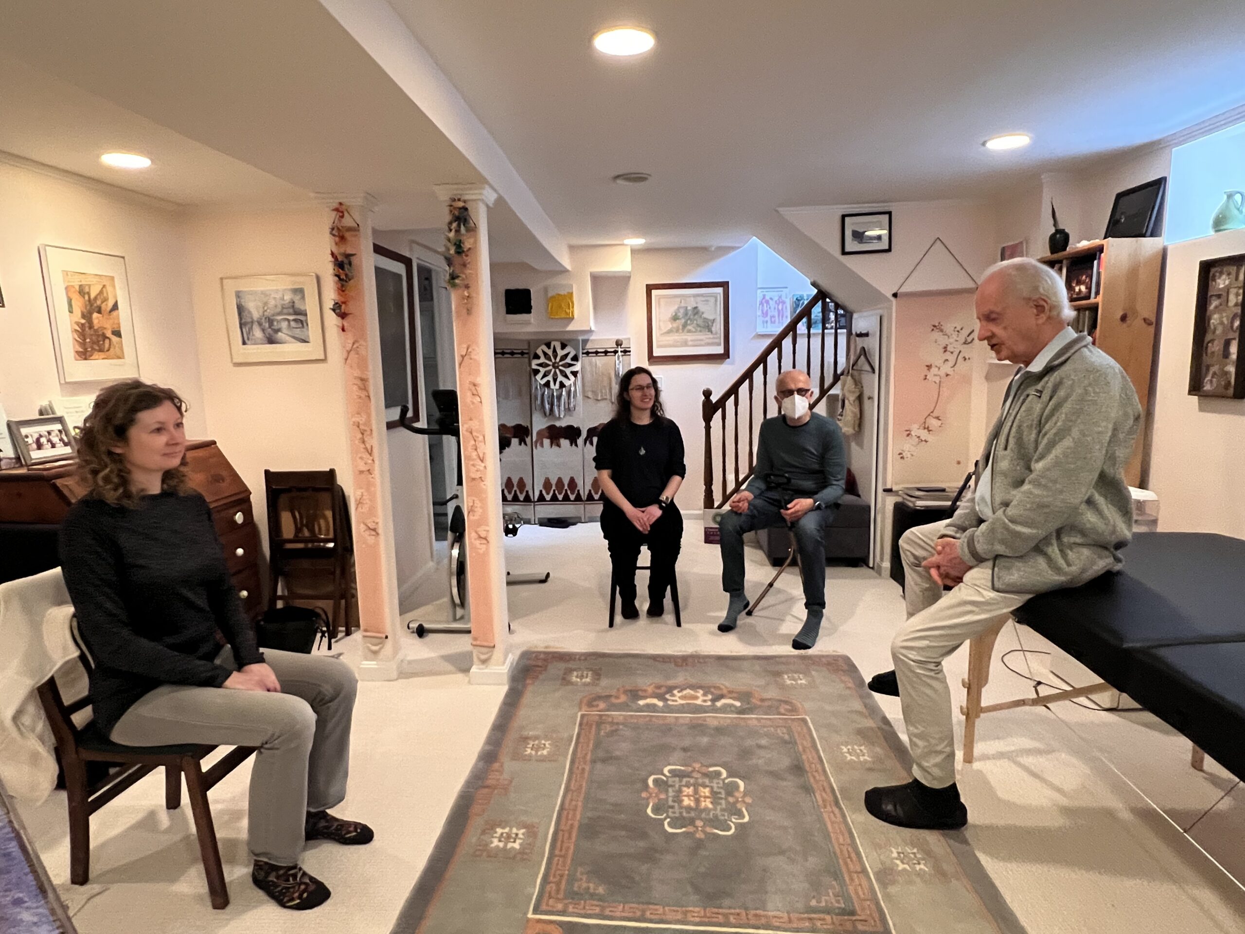 Tommy Thompson leading an Alexander Technique class with trainees seated in a semicircle, showing relational presence in group learning.