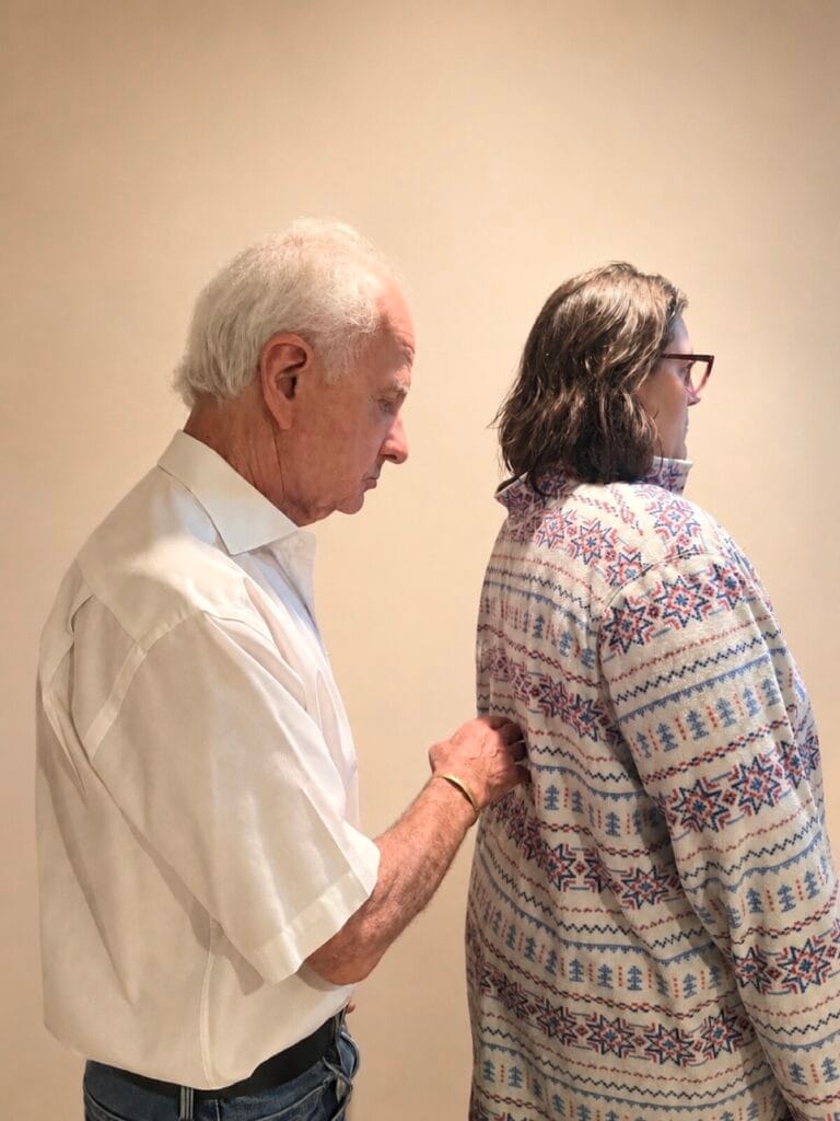 Tommy Thompson working hands-on with a trainee during an Alexander Technique class exploring presence in use and embodied coordination